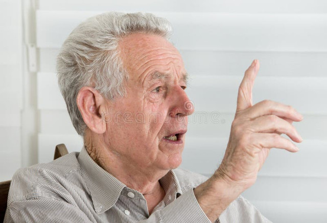 old-man-talking-38112716